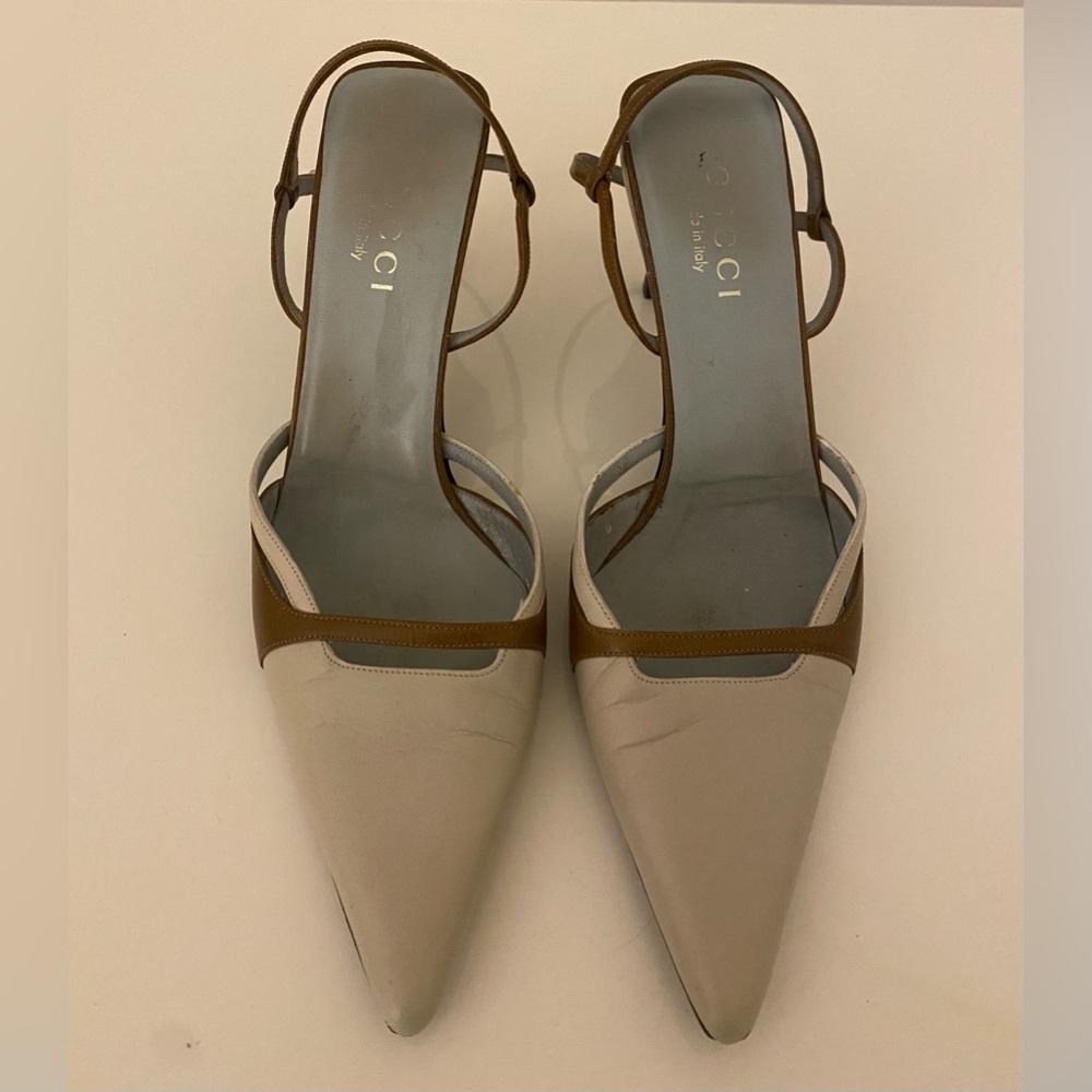 AUTHENTIC 
Gucci Tan Kitten Heel Sling Back 
(New Soles) 
Size: 7